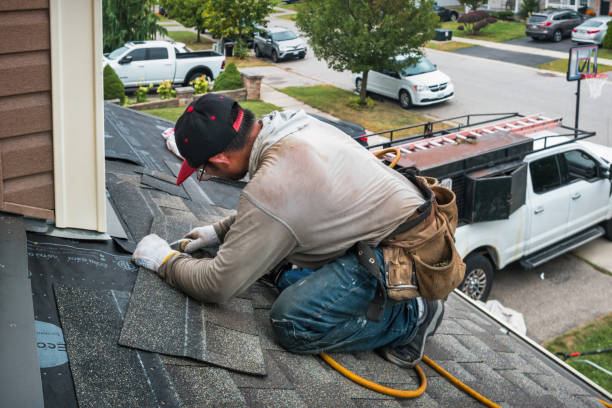 Professional Roofing technician working in Woodward, IA